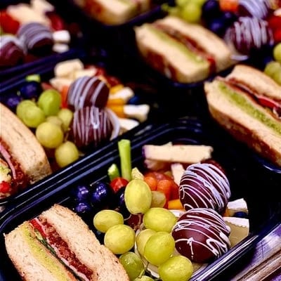 Individual Charcuttery Tray with Italian Pressed Sandwich.